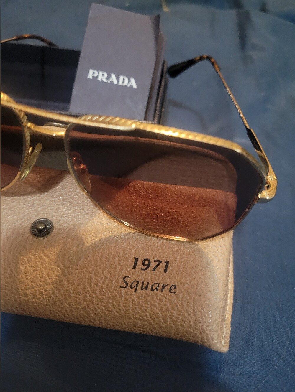 PRADA Unisex SPR63X Gold Aviator Holiday Edition Sunglasses - Gradient Lenses